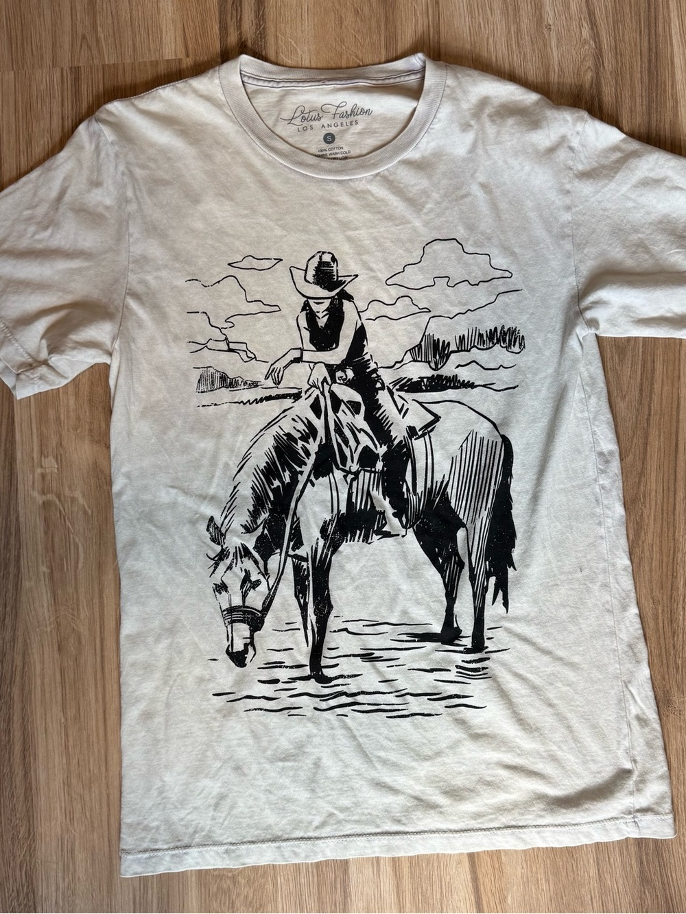 Lovers + Friends women’s Cream T-Shirt with Black Cowboy Graphic